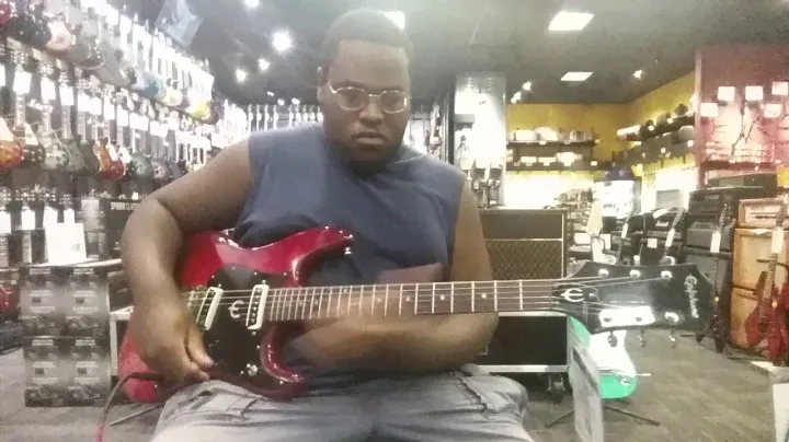 Playing a Vintage 1970s Epiphone ET 270 electric guitar Guitar Center in Salt Lake City, Utah