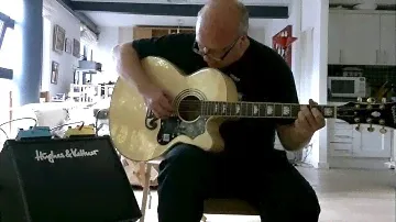 I love my new Epiphone EJ-200 CE/N electro-acoustic guitar!